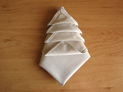 How to make a Christmas Tree by folding a napkin?