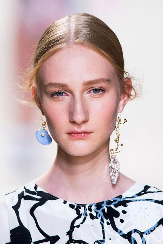 Two different on sale earrings trend