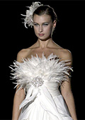 Wedding dresses with feathers and black embroidery are a total hit